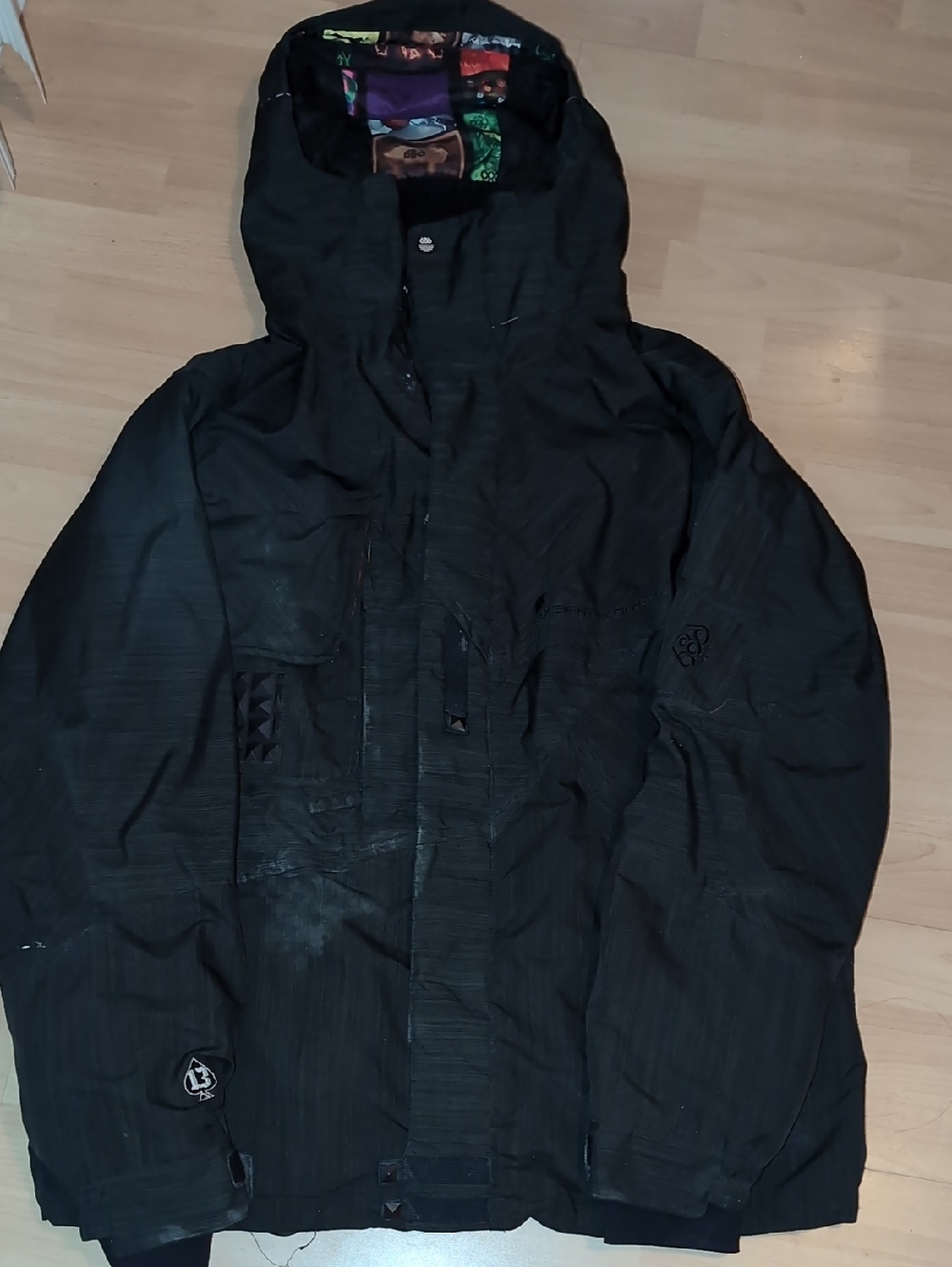 686 Black Hooded Ski Jacket with Patterned Lining